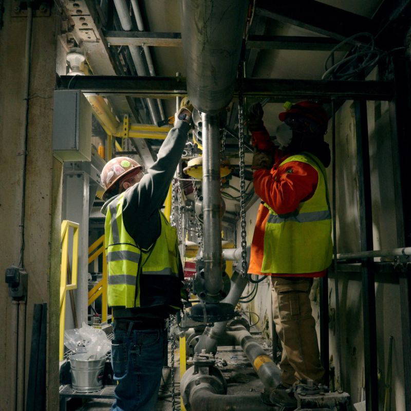 Lilja crew working on plant piping